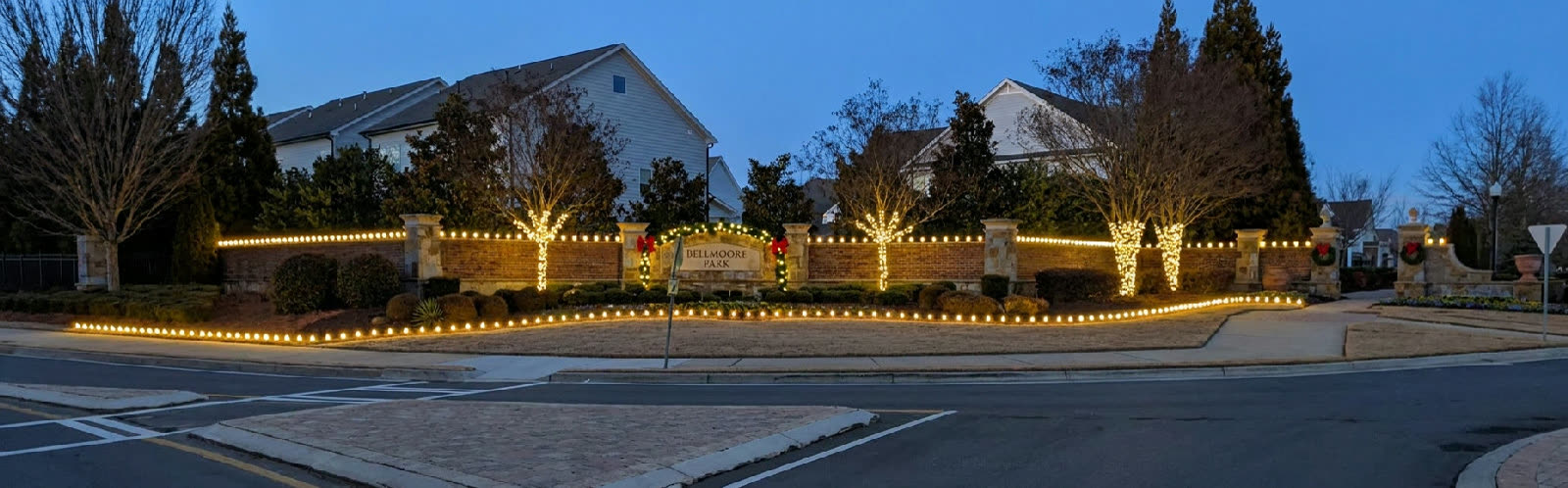 HOA front entrance monument with Christmas lights in metro Atlanta