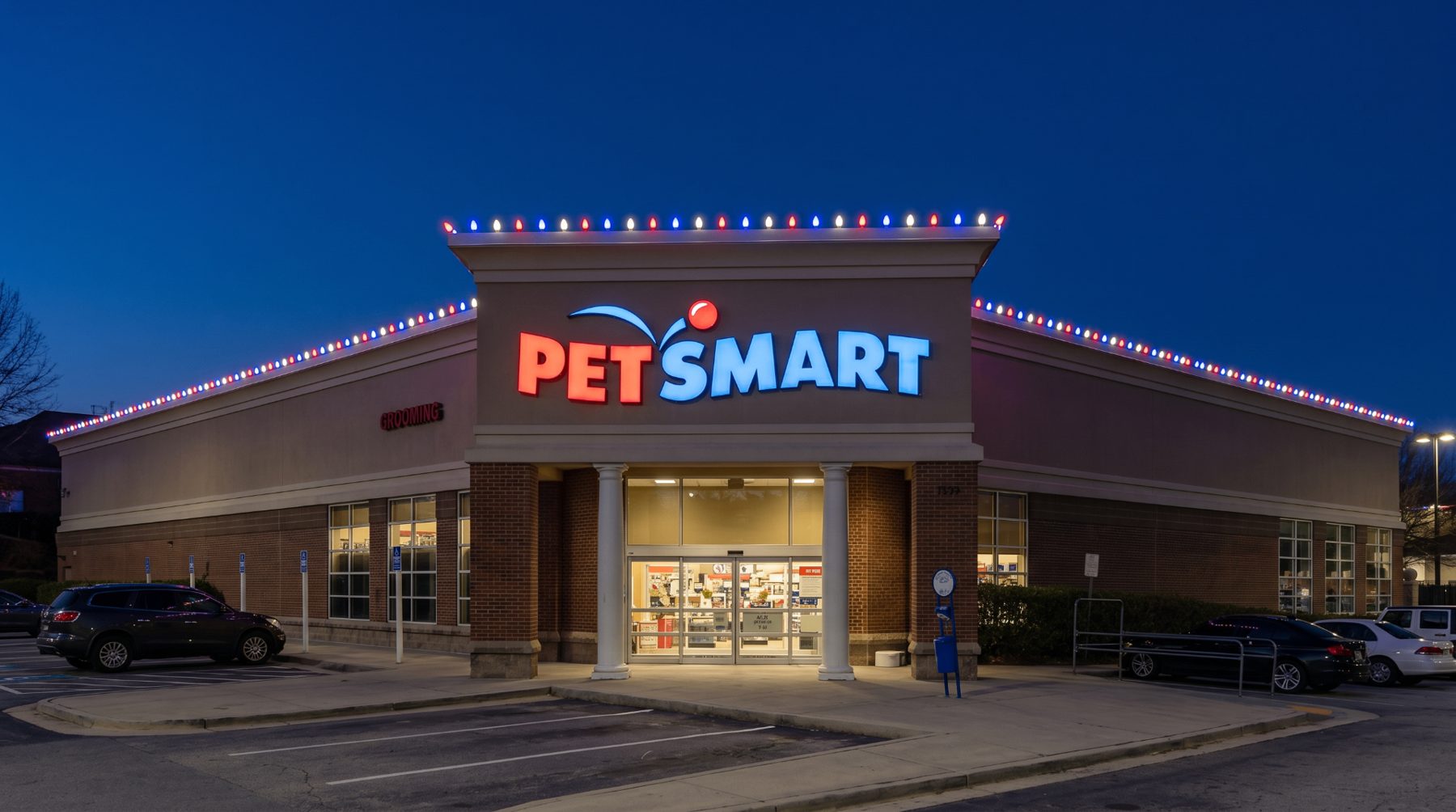 PetSmart commercial Christmas light installation in Atlanta GA with red white and blue C9 roofline lights