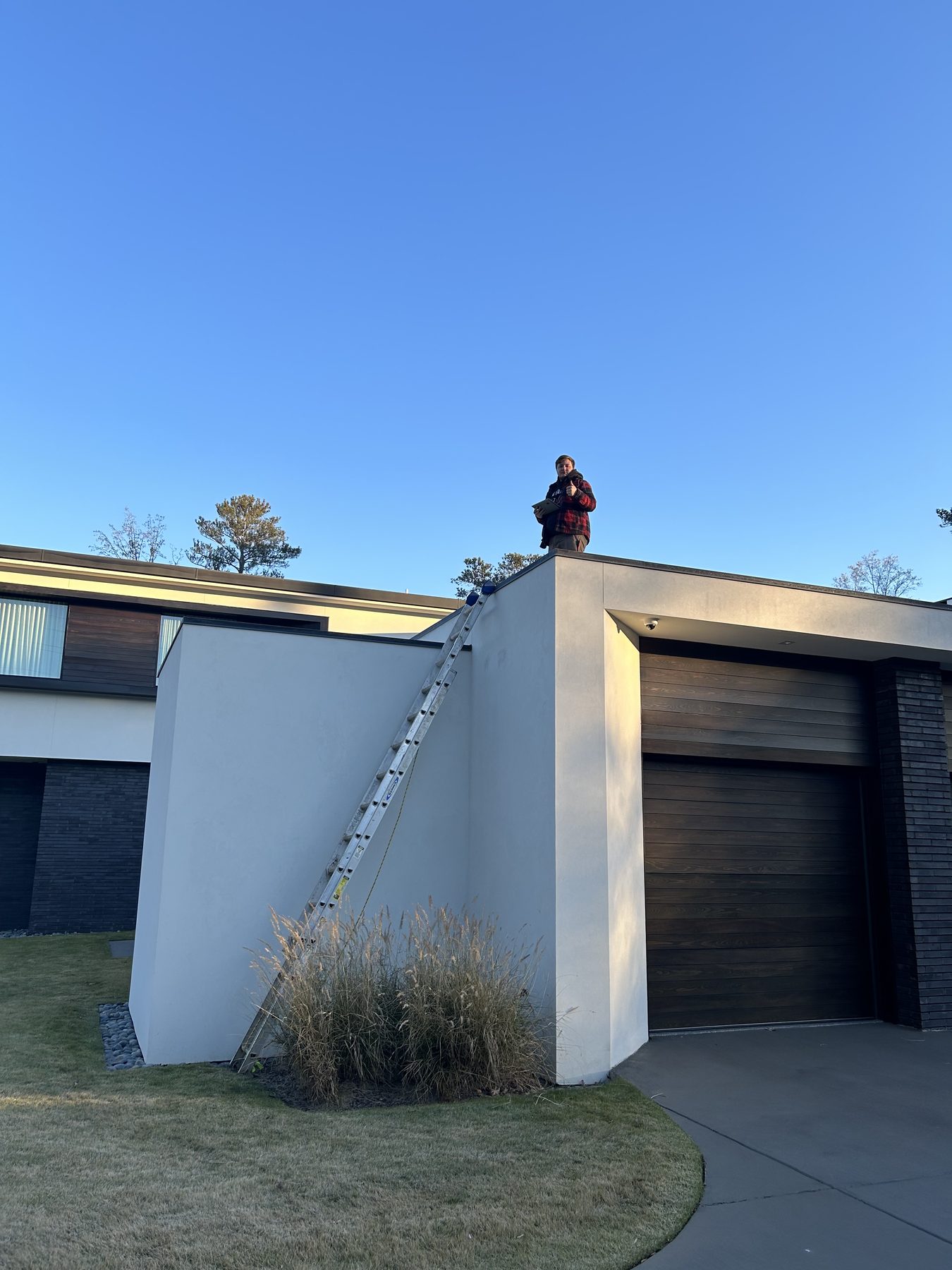 Dreamland holiday light installer working on a metro Atlanta home