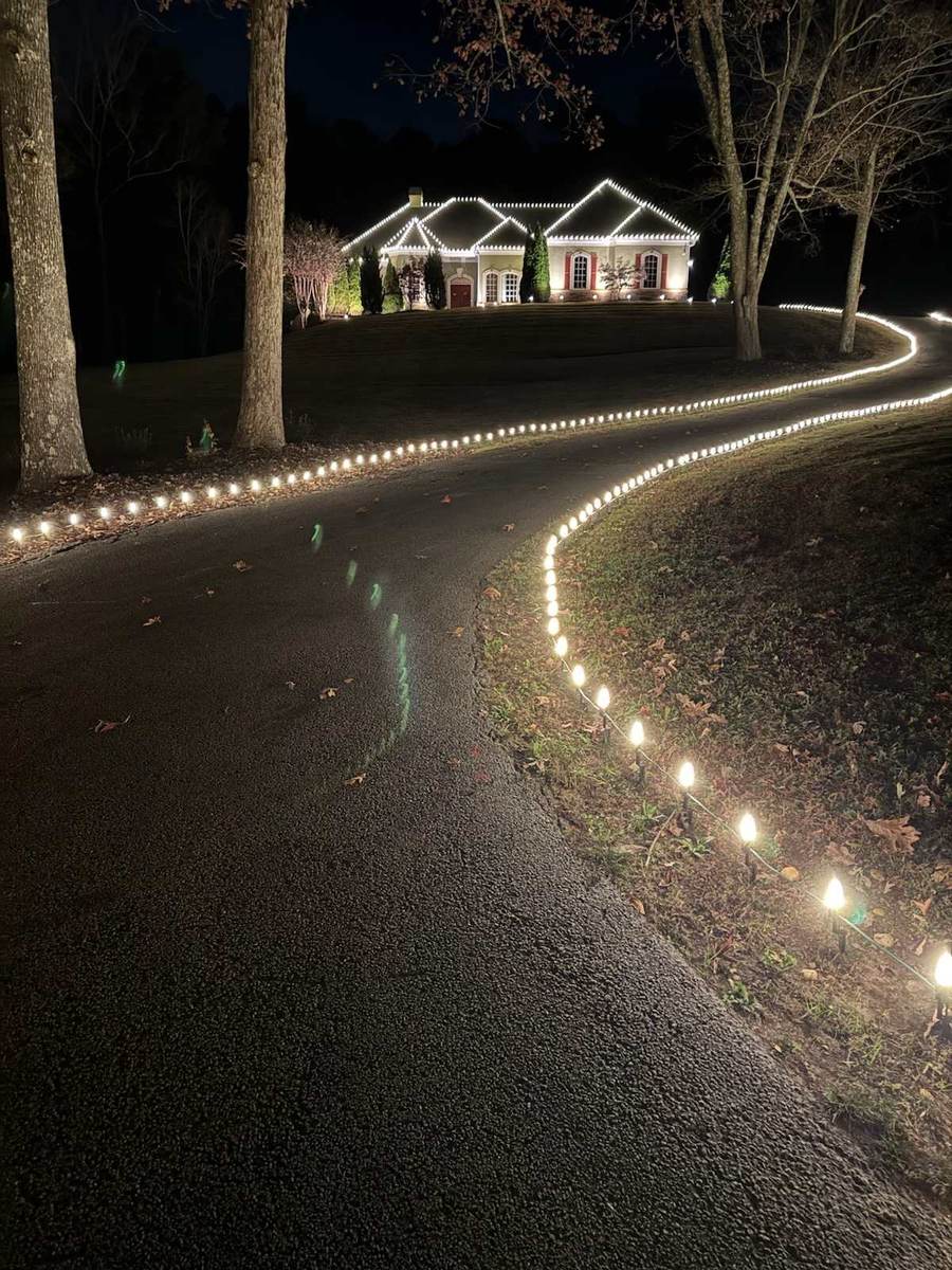 Driveway and pathway Christmas light installation on winding drive in Atlanta GA