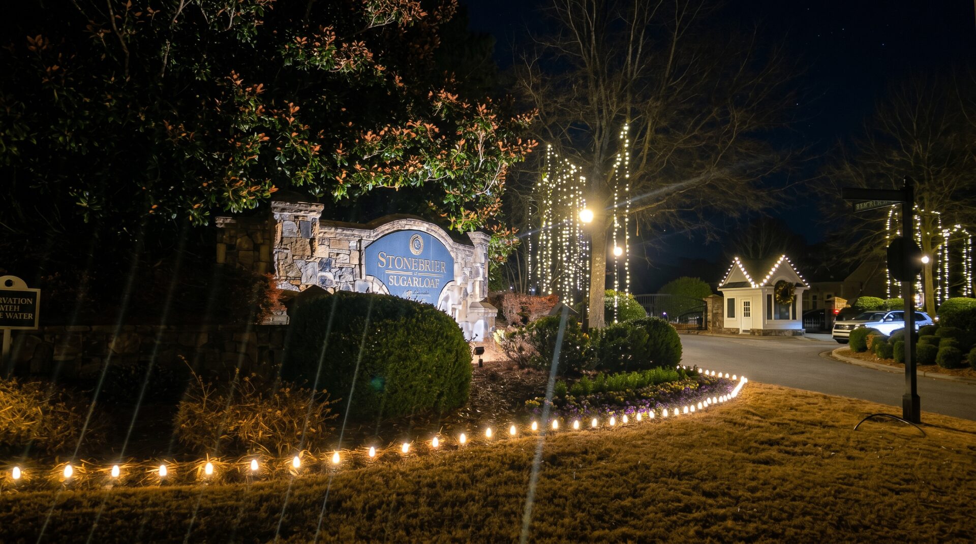 Stonebrier at Sugarloaf HOA entrance Christmas lighting in Duluth GA
