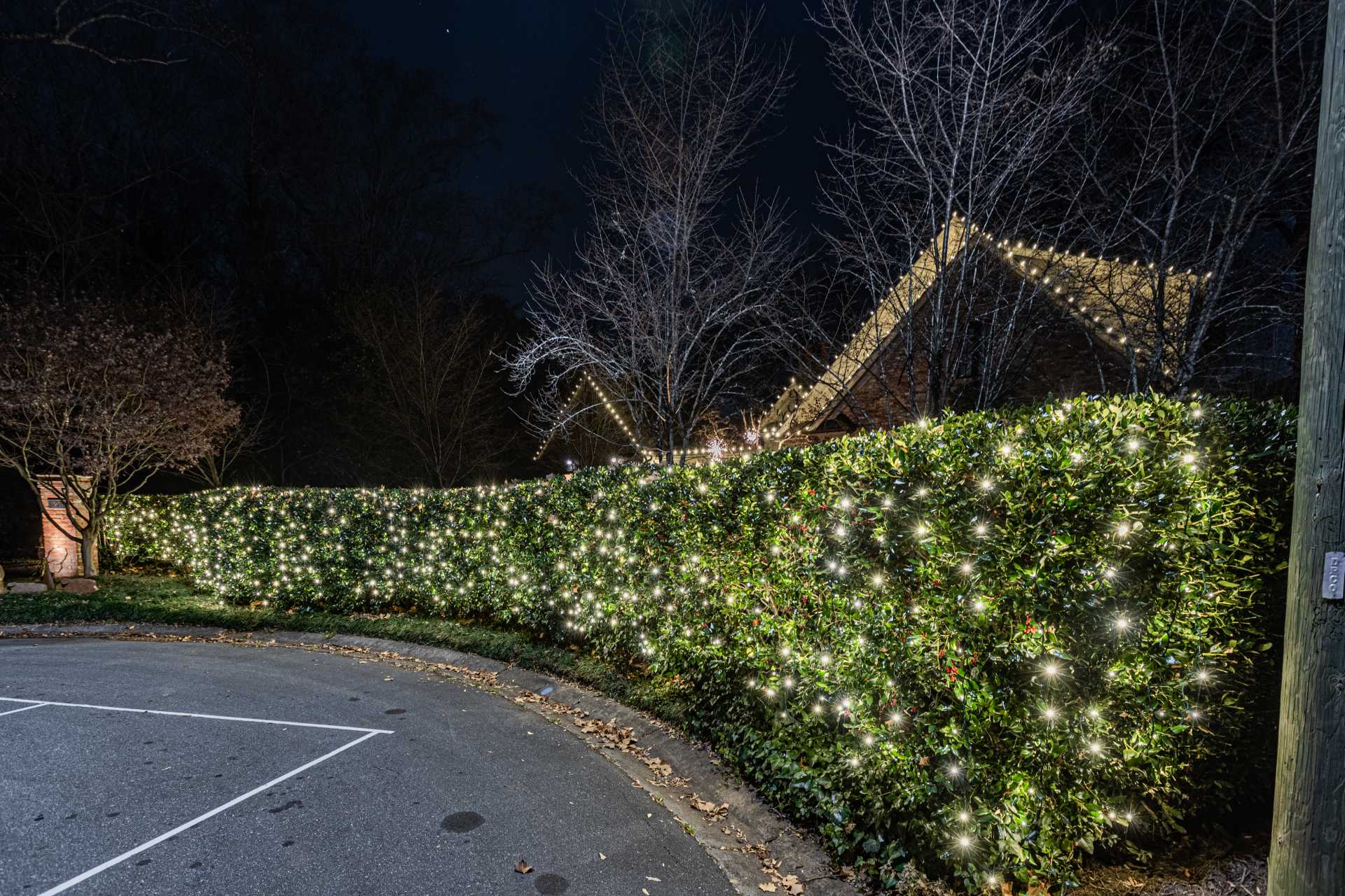 Christmas garlands and wreaths with warm lights on Atlanta home